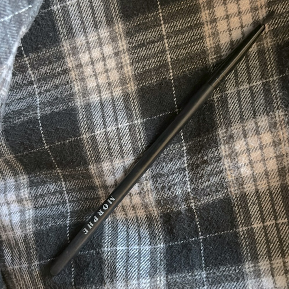 Small pointed detail brush.